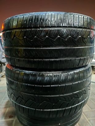 295-35-20 Nitto brand Tire.